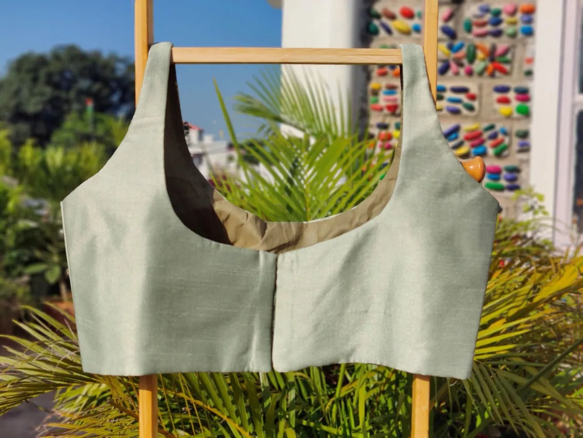 PASTEL GREEN SLEEVELESS BLOUSE